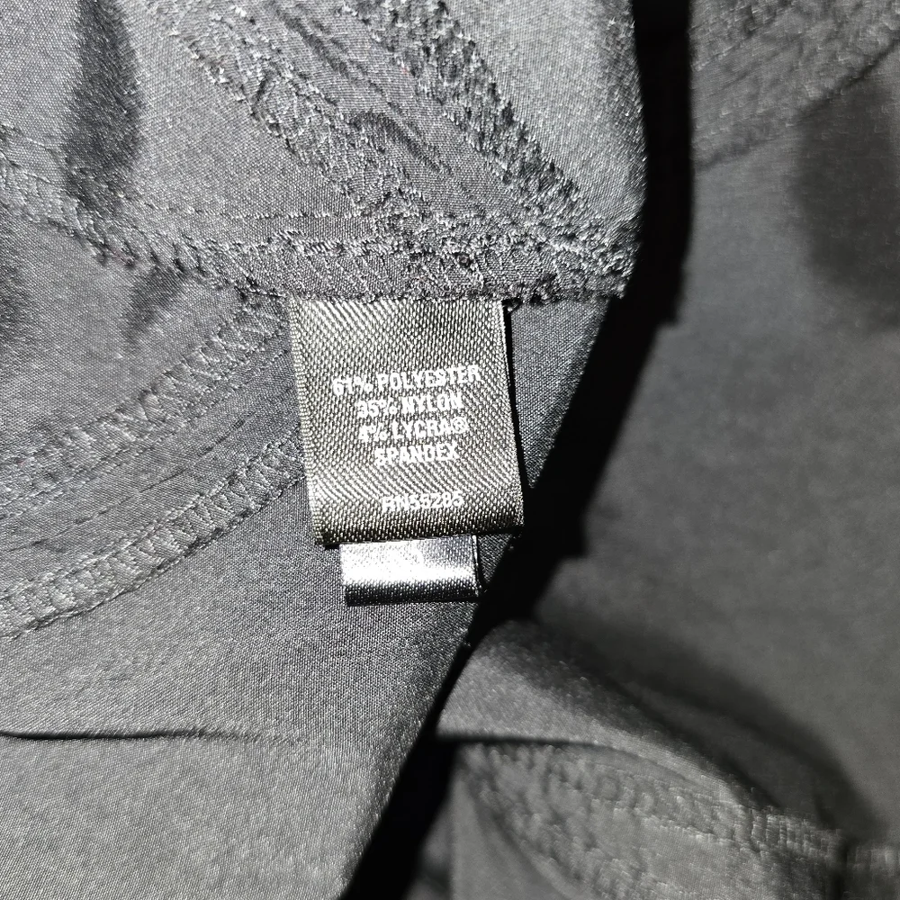 Express black size M womens blouse. Side zipper with buckle accent in front‎